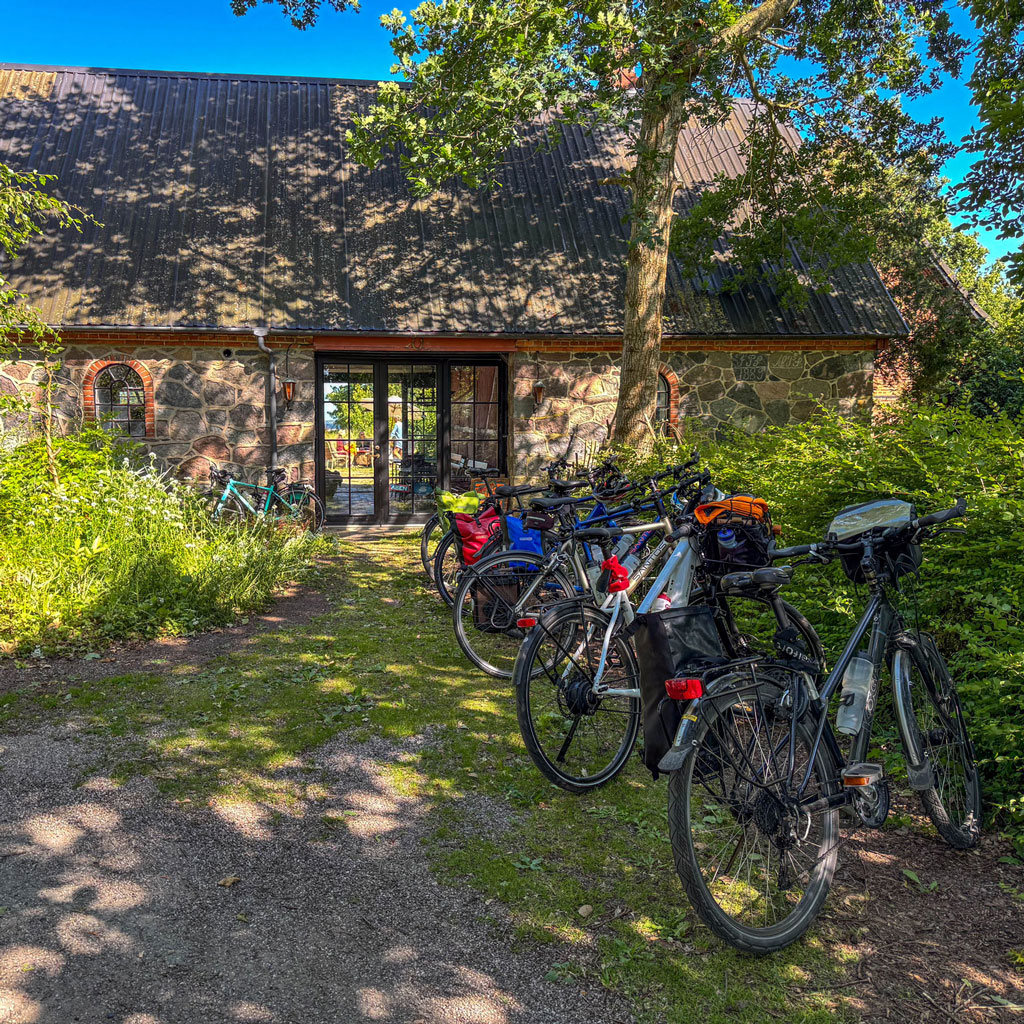 Bicycles parked in front of the guesthouse, our organic cafe (restaurant) and bed & breakfast (hotel) where we serve slow brew coffee and homemade cake.
