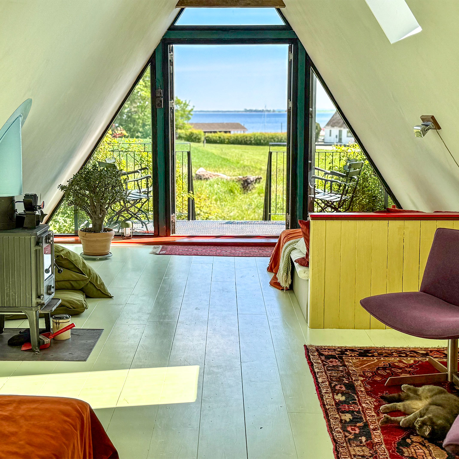 Water views from a bright suite at an organic B&B in Sandvig, South Zealand, located right on the Copenhagen-Berlin and Munkevejen cycle routes.